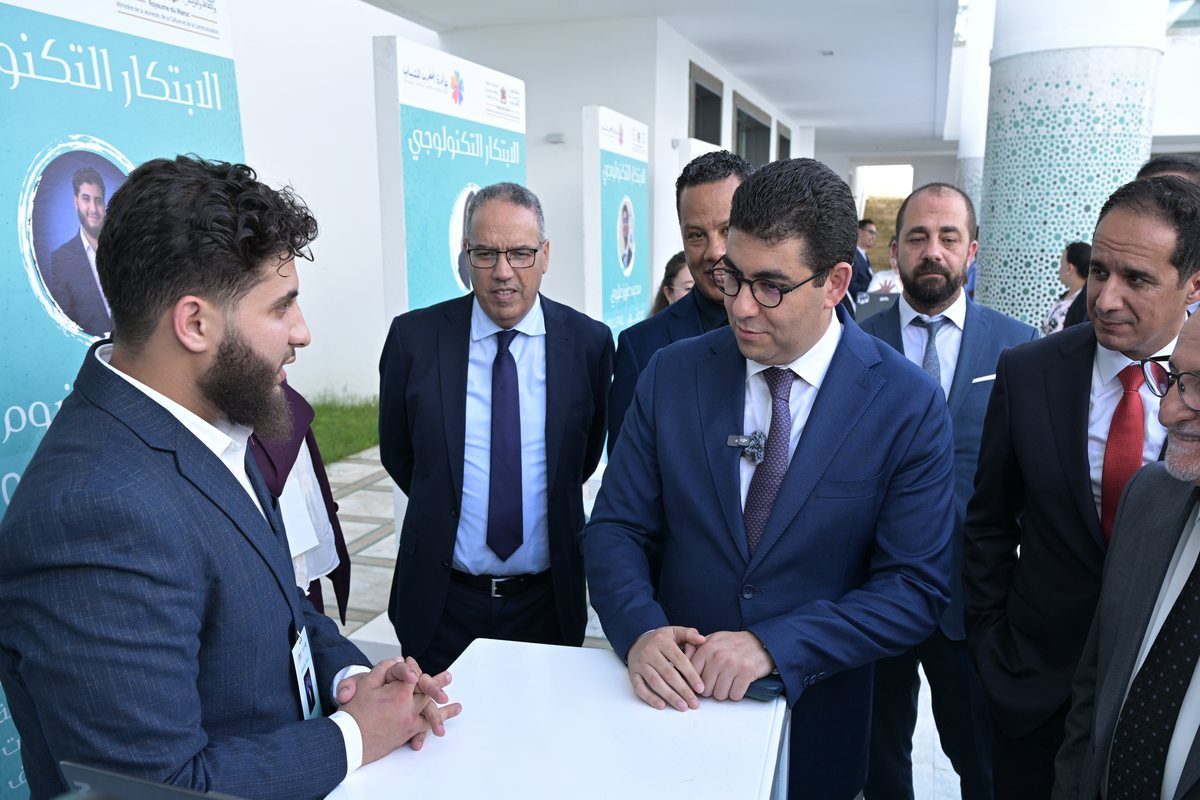 The Minister of Youth, Culture and Communication visiting the COROSOLS stand at the Prix Maroc Jeunesse.