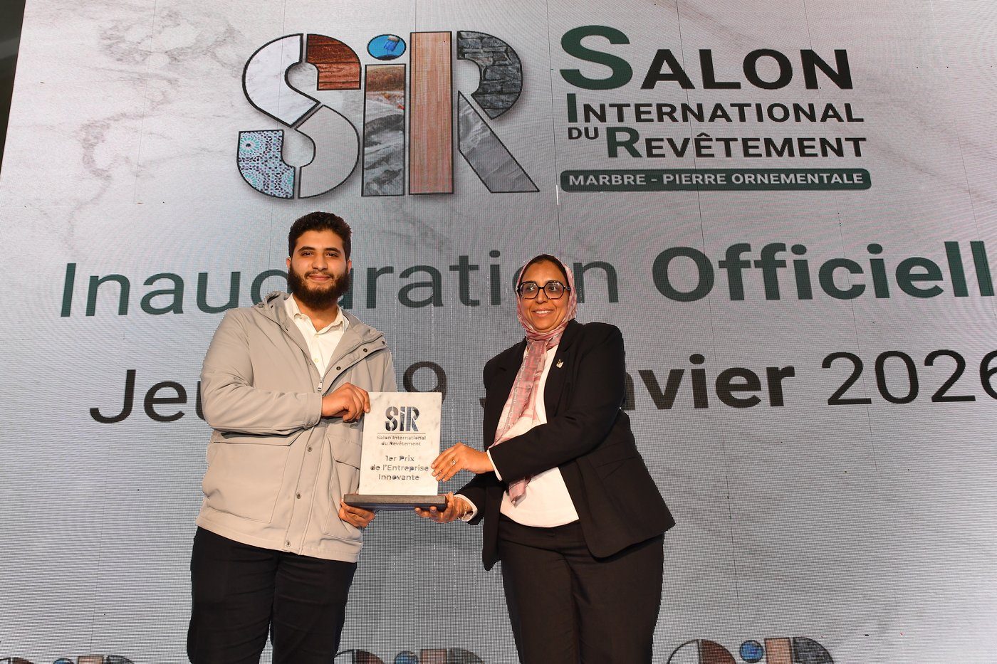 Hamza receiving the 1st Prize for Most Innovative Enterprise at the Salon International du Revêtement 2026.